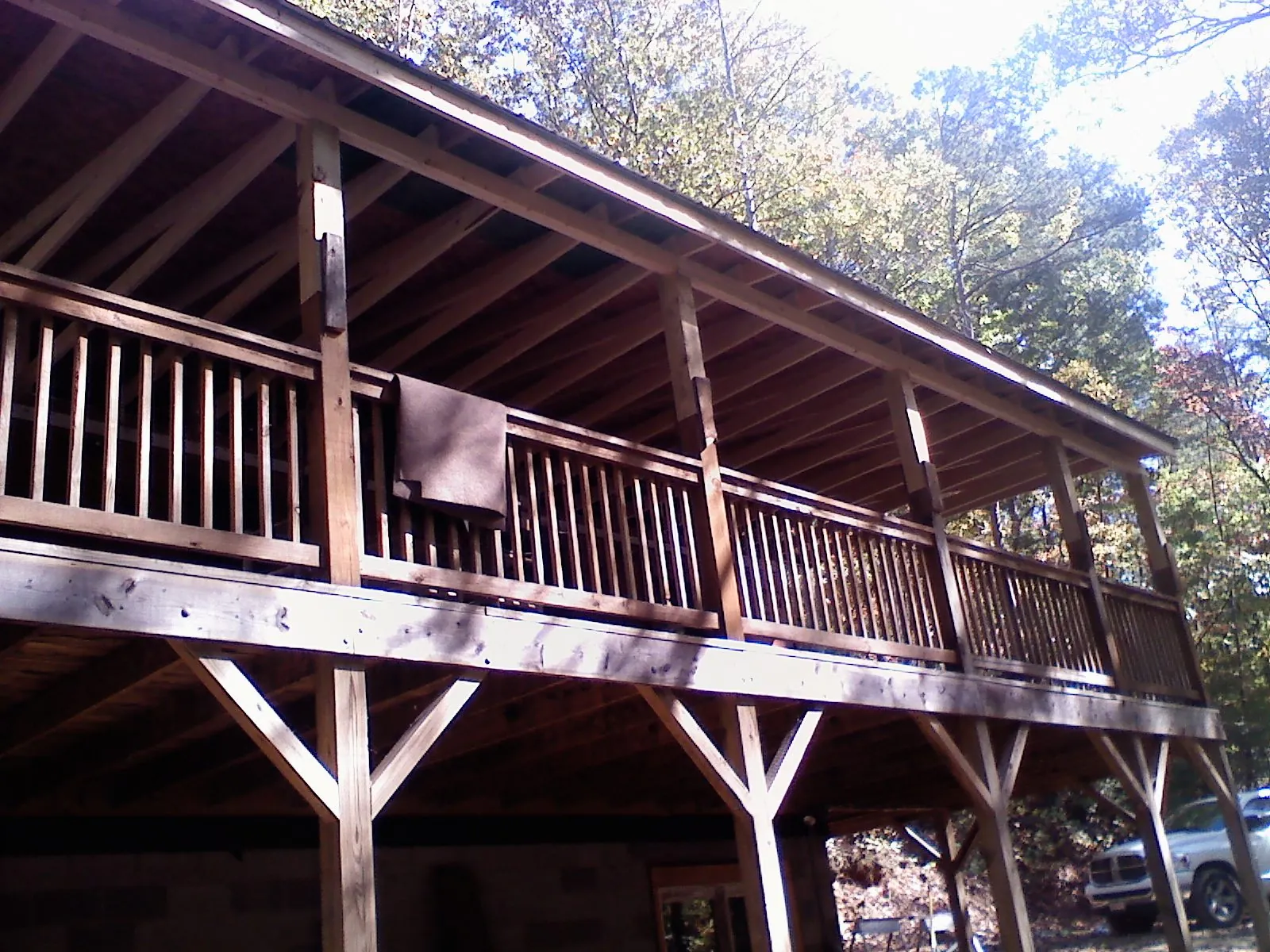 Timber framing under a new elevated porch and deck — Roof Leak Repair in Fairview Heights by Roofing Brothers